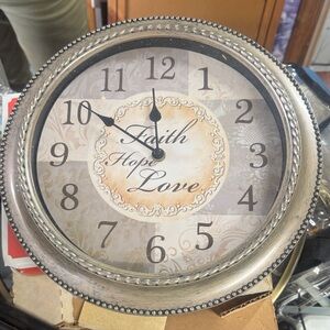 Elegant Silver Wall Clock with Inspirational Design